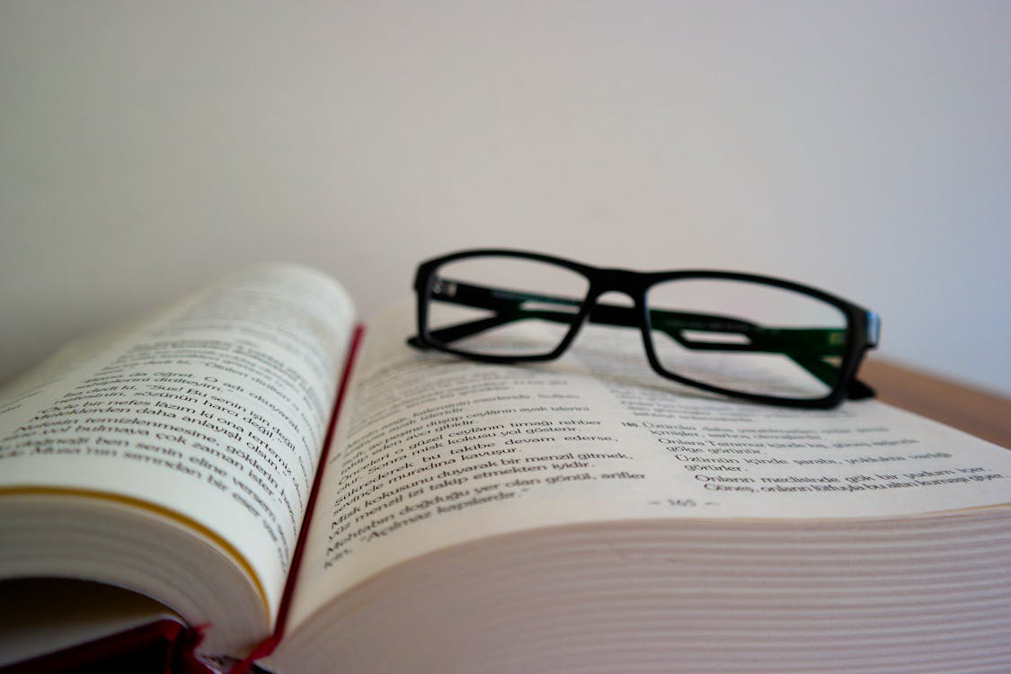 a book with glasses.